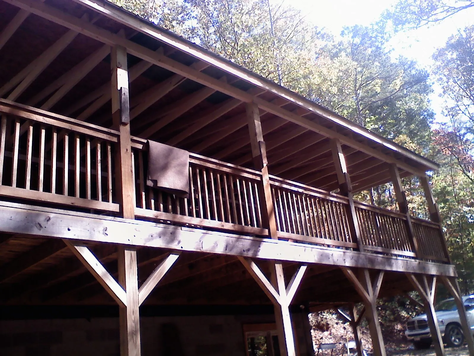 Timber framing under a new elevated porch and deck — Roof Leak Repair in Fruitport by Roofing Brothers